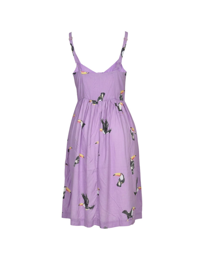 Purple dress with bird pattern on a white background