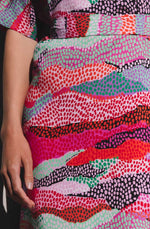 DEVOI Annie dress in our Sediment printed Modal. Belted at the waist with a round neckline. Finishes just below the knee.  Close up of fabric.
