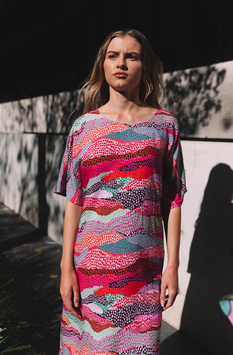 DEVOI Annie dress in our Sediment printed Modal. Belted at the waist with a round neckline. Finishes just below the knee.  Front bodice view on model.