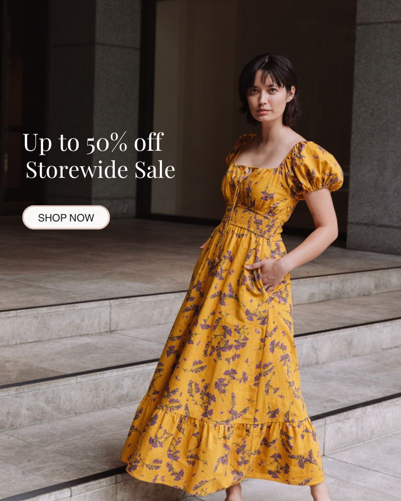 Woman in a yellow floral dress standing on steps with promotional text overlay.