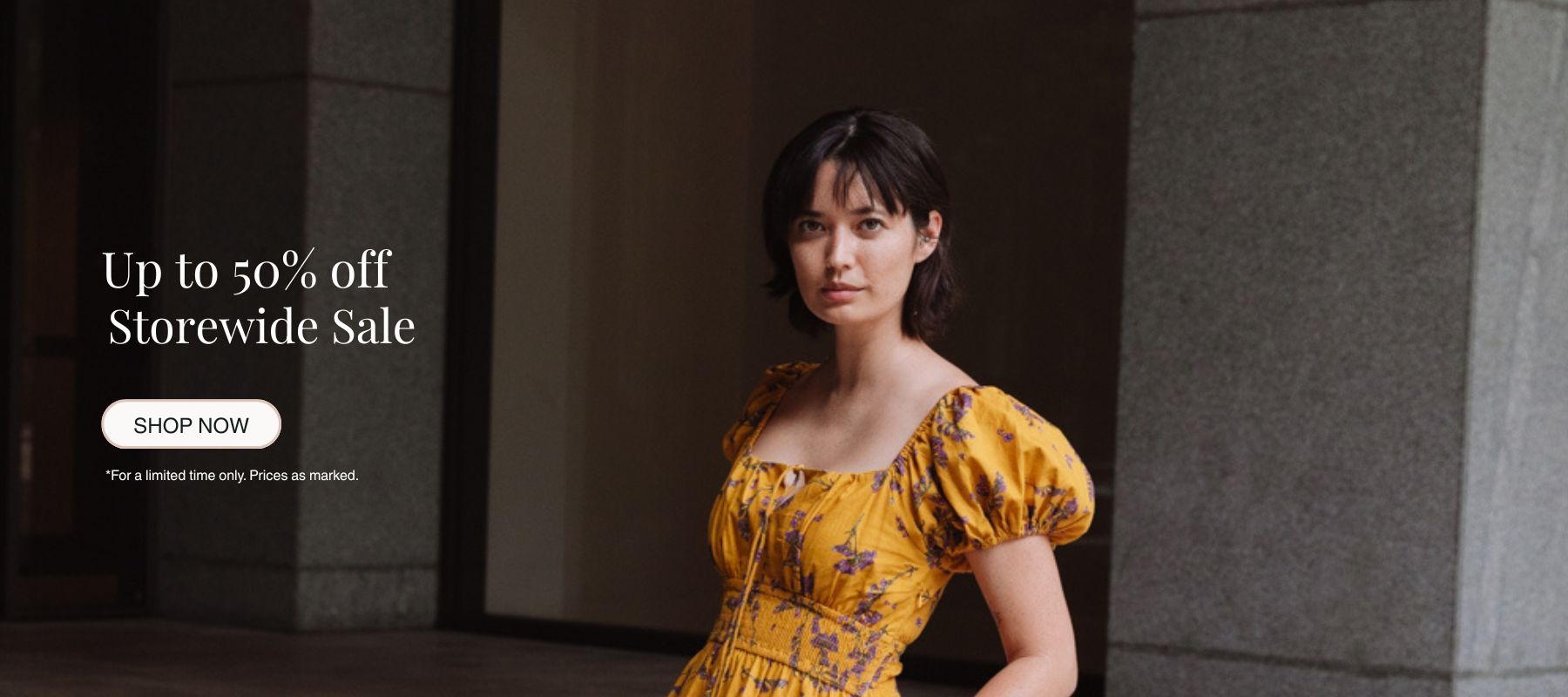 Woman in a yellow dress standing against a dark background with promotional text for a storewide sale.