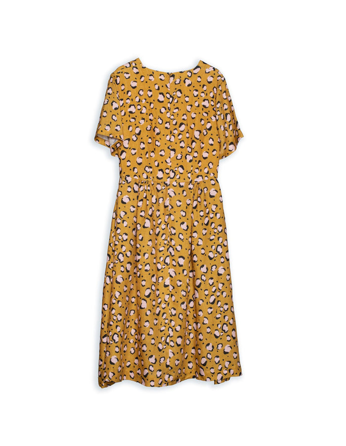 DEVOI Dorothy dress in printed mustard Pink Leopard. Short sleeves. Finishes at the knee. Back view