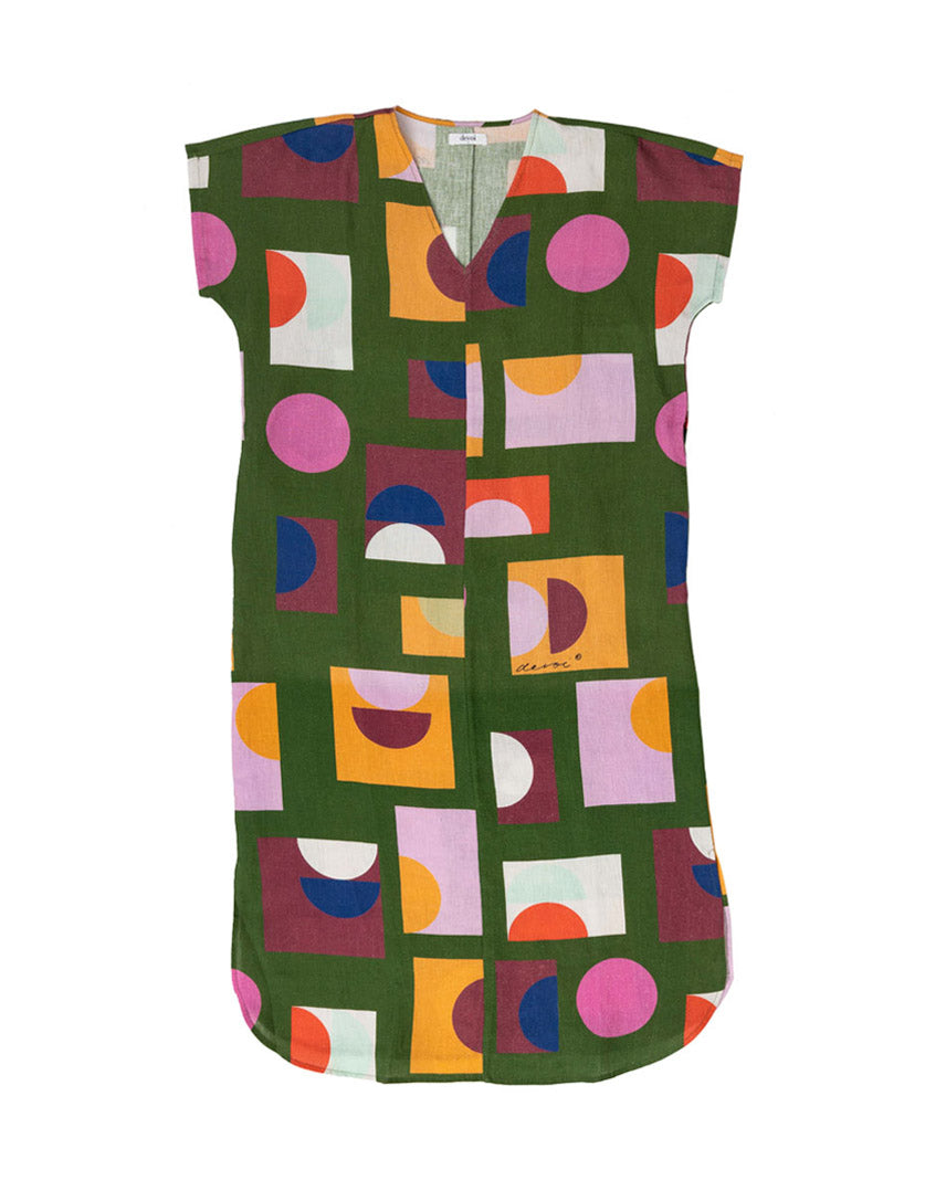 DEVOI green Ivy dress in our Olive Just Pretend print. 100% Linen. Dress has a v-neck, short sleeves and a front and back centre seam. The dress comes with a belt in self fabric to tie at the waist. Front flat lay