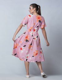 DEVOI Lilac Magnolia printed Dorothy dress in linen. Back view on model.