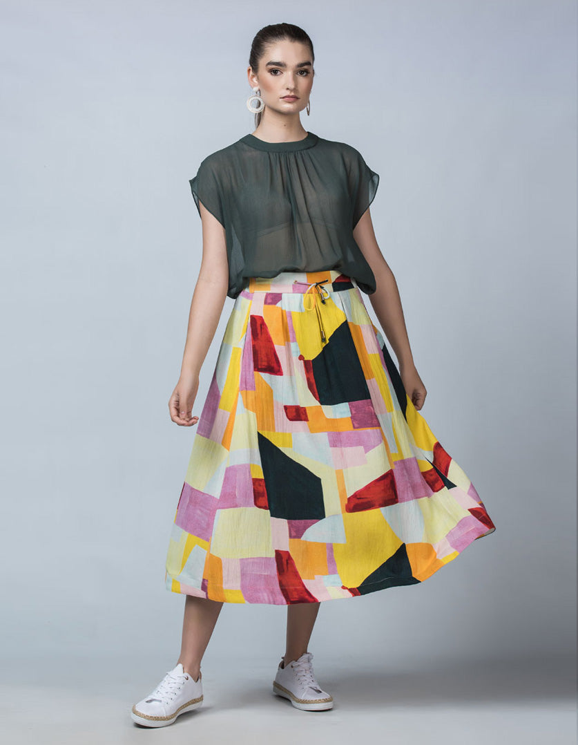 DEVOI Kathleen skirt in the Patchwork printed linen. Elasticated waistband, pockets. Midi length. Front view