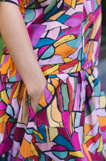 DEVOI Rejoice printed Modal skirt. Elasticated back waist. Flat front waist. Pockts! Finishes just below the knee. Close up of pocket.