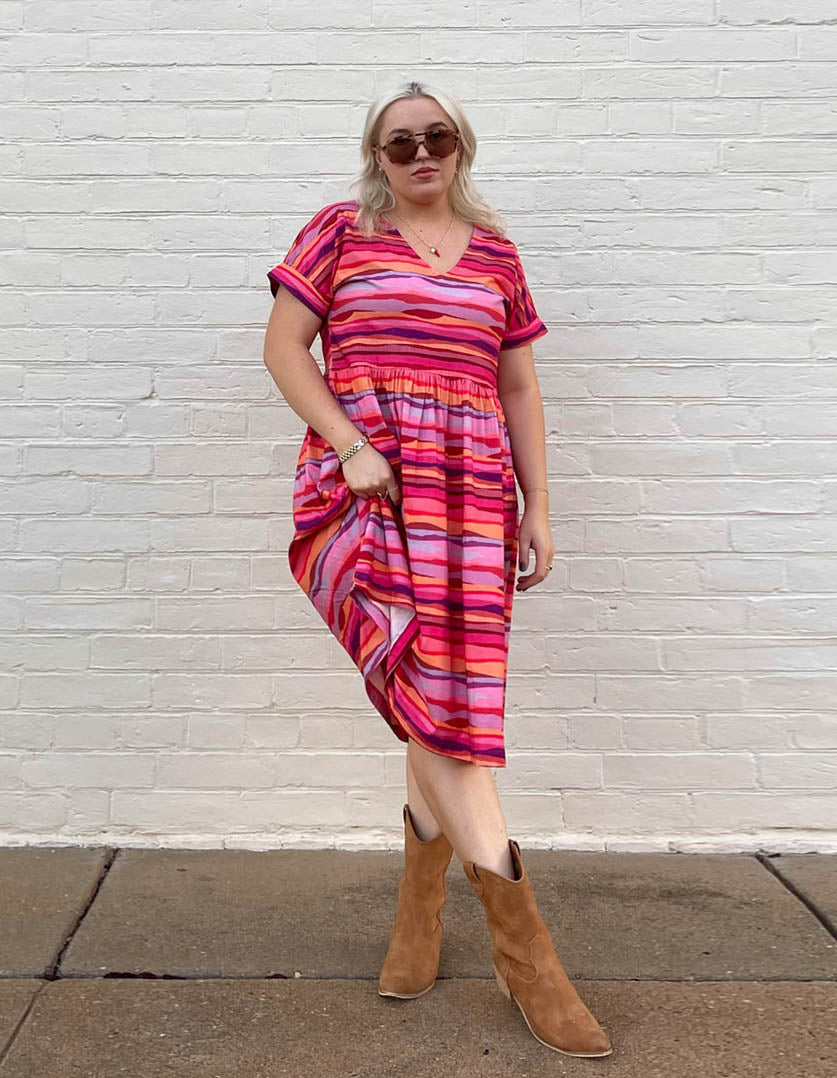 DEVOI Kayleigh dress in Sunset Tide printed 100% Organic Cotton Soft v-neck dress with short sleeves. Finishes just below the knee depending on height. Front view