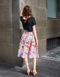 DEVOI Kathleen skirt in Urban Scapes print. Front view. 100% Linen, hand painted print. Back view