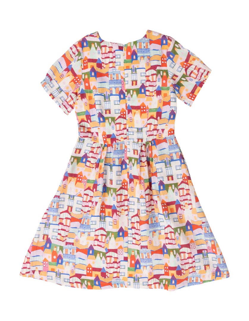 DEVOI White Urban Scapes Dorothy dress in printed Linen. Round neckline. Knee length. Short sleeves. Pockets. Back flat lay view.