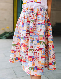 DEVOI Kathleen skirt in Urban Scapes print. Front view. 100% Linen, hand painted print. skirt close-up