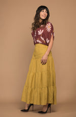 DEVOI maxi linen skirt in Mustard.  Skirt has pockets and an elasticated waistband.