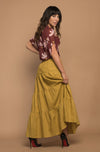 DEVOI maxi linen skirt in Mustard. Skirt has pockets and an elasticated waistband.