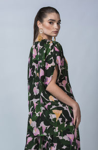 DEVOI Cate top in Purple Calla Lilies printed cupro, vegan silk. Green and floral print. Floaty blouse with a round neck collar and hidden button placket.