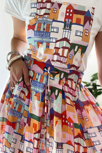     DA_278_Devoi_200311  1000 × 1500px  DEVOI Kathleen skirt in Urban Scapes print. Front waist view. 100% Linen, hand painted print.