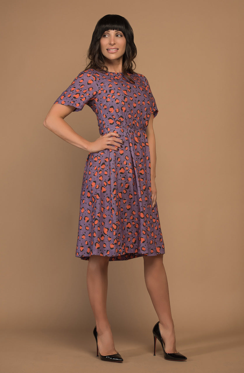DEVOI Dorothy dress in Purple Leopard. The Dorothy is a linen-mix dress with a crew neck and gathering at the side waist seam at front and back. The dress has side-seam pockets! and is fastened at the back with an invisible zip and hook & eye.  The dress bodice is lined. 
