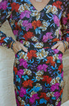 DEVOI Frances pencil skirt in stretch cotton. This skirt is printed in Black Empress floral print. the skirt is super comfy and has pockets and a back vent.