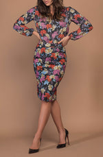 DEVOI Frances pencil skirt in stretch cotton. This skirt is printed in Black Empress floral print. the skirt is super comfy and has pockets and a back vent.