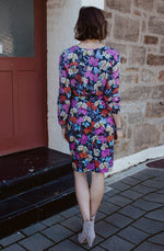 DEVOI Frances pencil skirt in stretch cotton. This skirt is printed in Black Empress floral print. the skirt is super comfy and has pockets and a back vent.