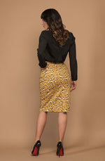 DEVOI Frances skirt in printed Mustard Leopard stretch cotton.  Pencil skirt with pockets, fastened with an invisible zip at the back. Skirt also has a back vent.