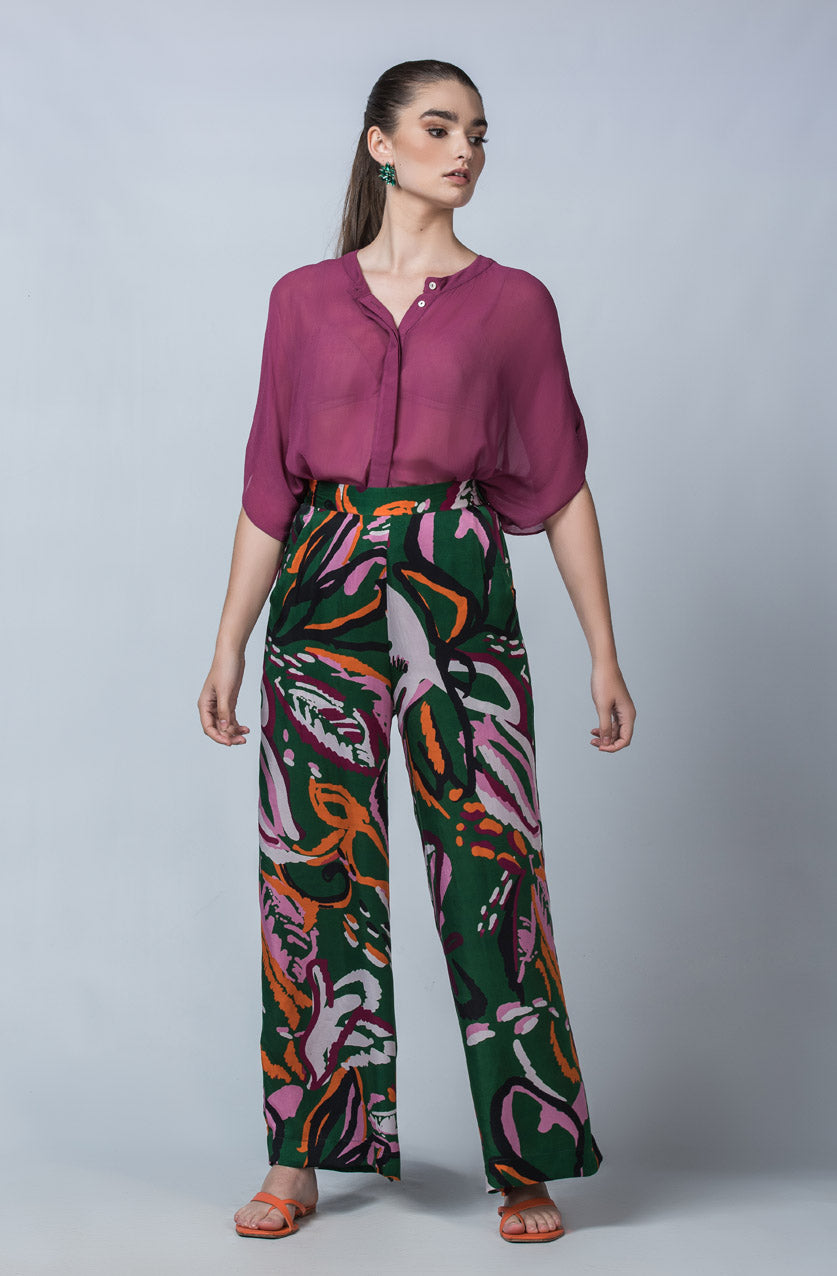 DEVOI Stevie pants in Wild Green Thing printed cupro, vegan silk. Green floral print. Wide leg palazzo pants.