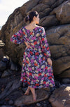 DEVOI Sybille shift dress in floral empress print. Midi dress with long sleeves, a belt and pockets.